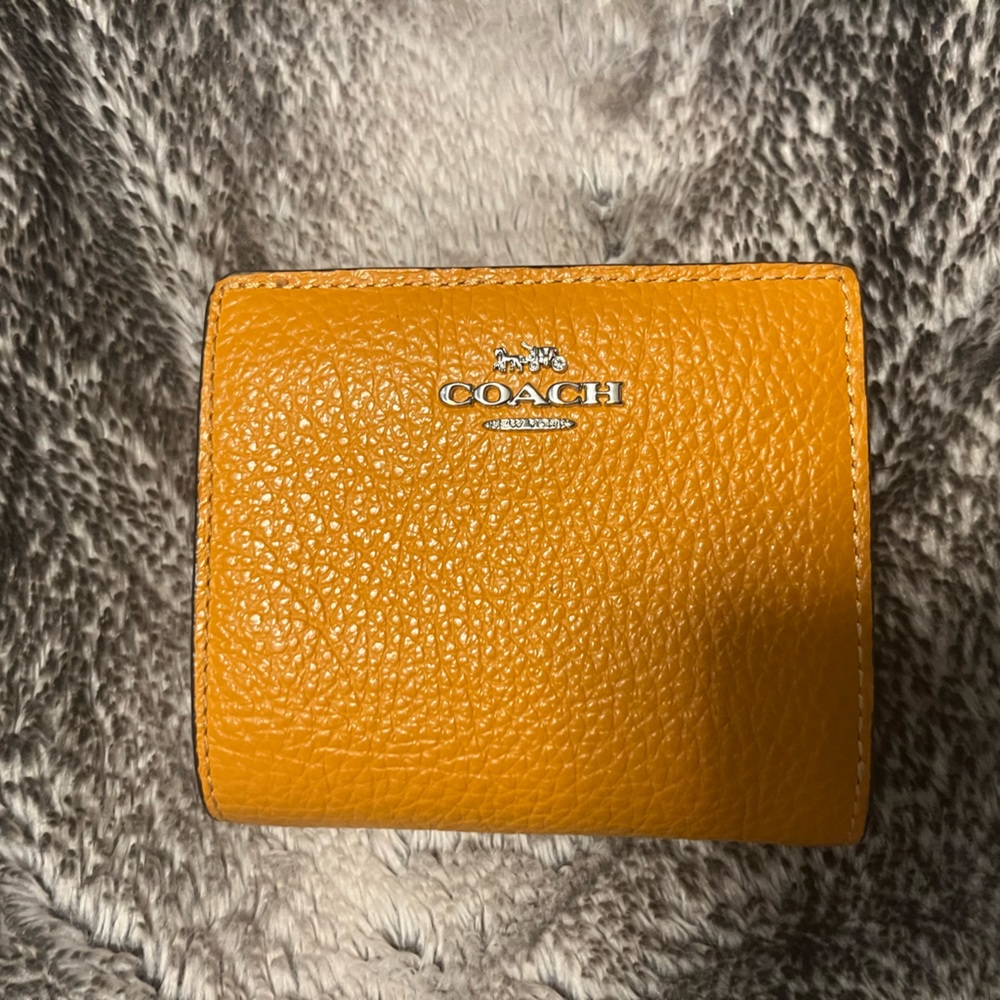 Coach bi-fold wallet